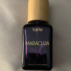 Tarte Maracuja Oil in Purple Bottle with Bamboo Cap